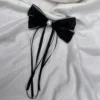Black polka dot bow long